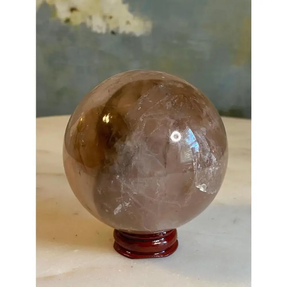 Large hematoid fire quartz sphere
